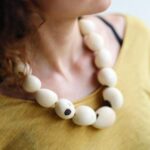 Trendy Accessories - A Person Wearing a Trendy Necklace