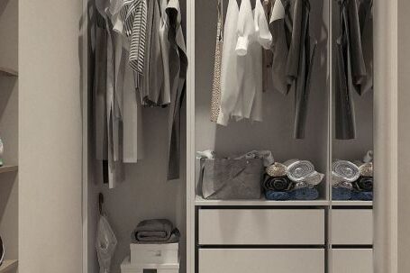 Wardrobe Essentials - Assorted Clothes Hanged Inside Cabinet