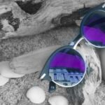 Trendy Accessories - Neo Chrome Sunglasses With Silver and Black Frame on Brown Firewood